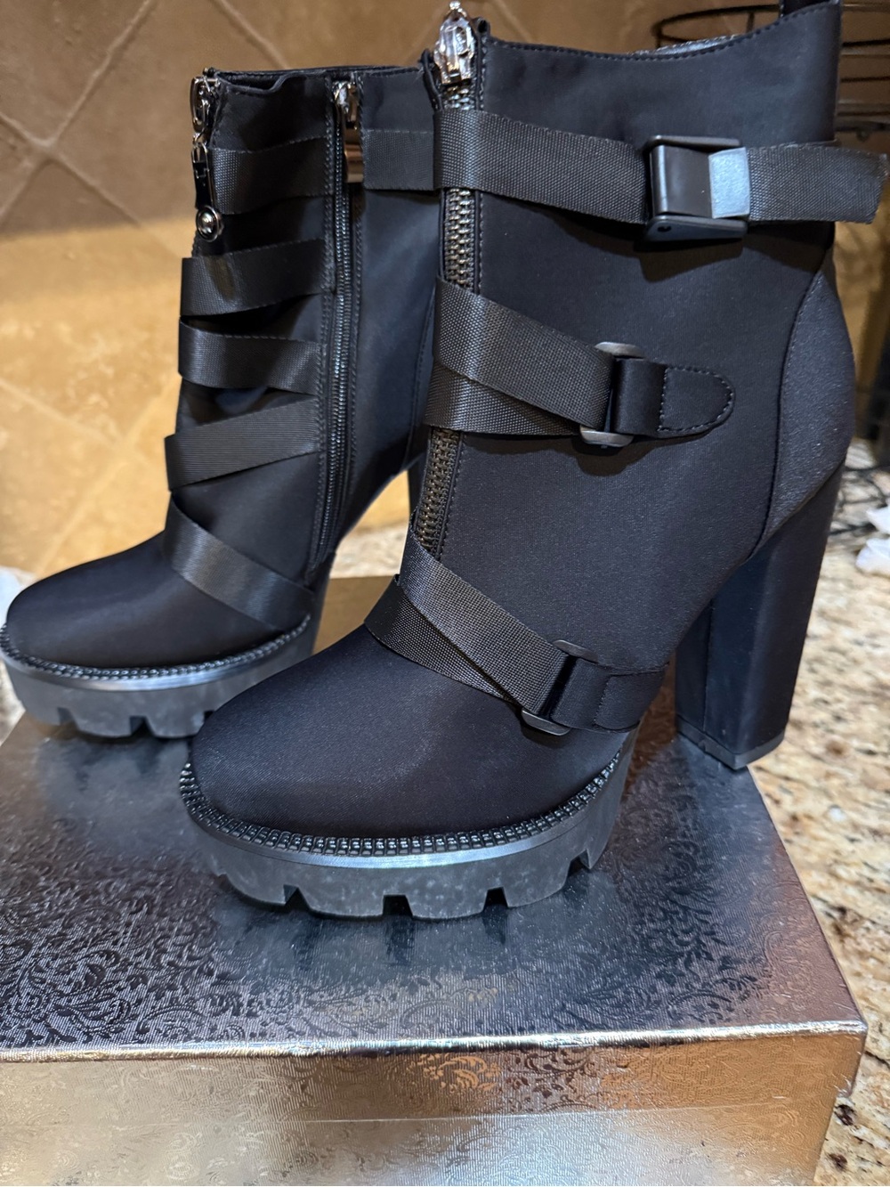 Wetkiss Women’s Black Strappy Lug-Heel  Boots